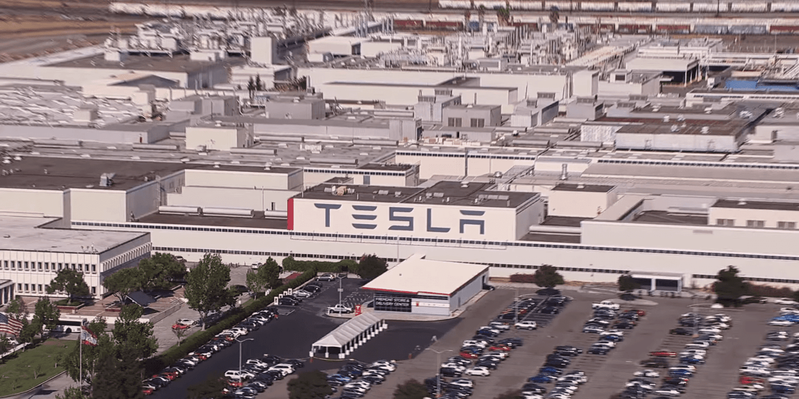 Tesla partly settles racism lawsuit as hundreds of workers press on