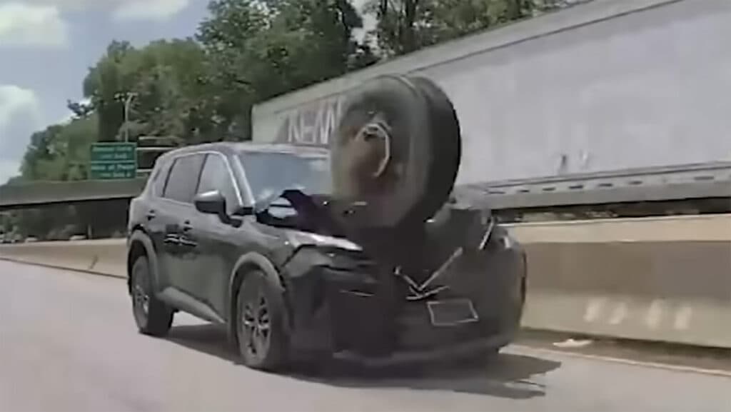 Runaway Tire Jumps Highway Median And Wrecks A Nissan SUV On Camera